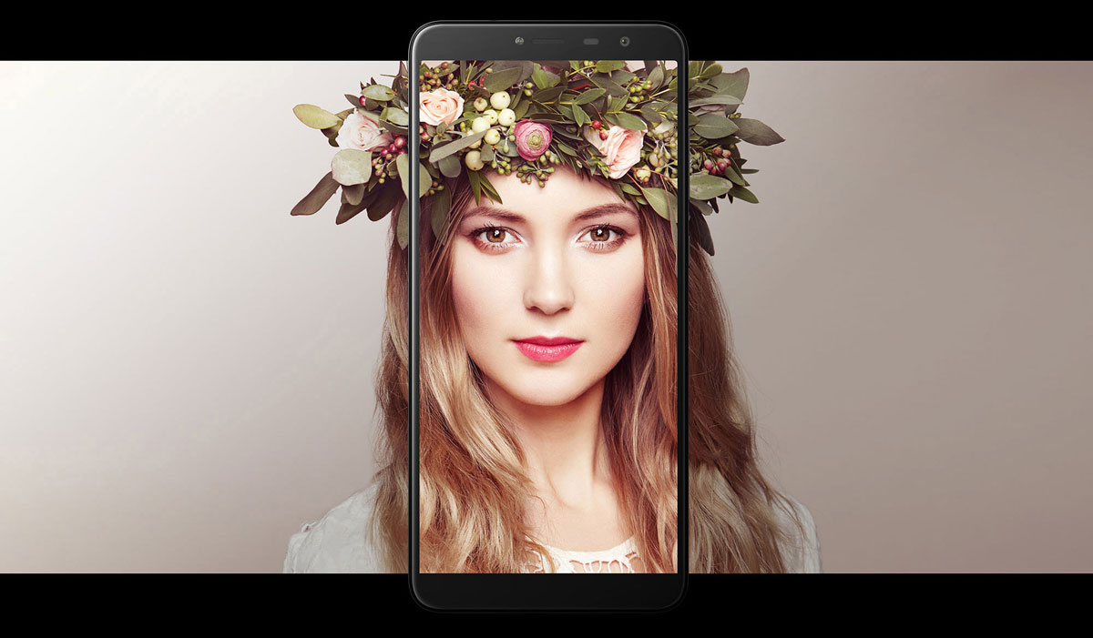 Hisense Infinity F24 Phone Blending with the Portrait of a Young Woman Wearing a Flowery Leaf-Covered Crown