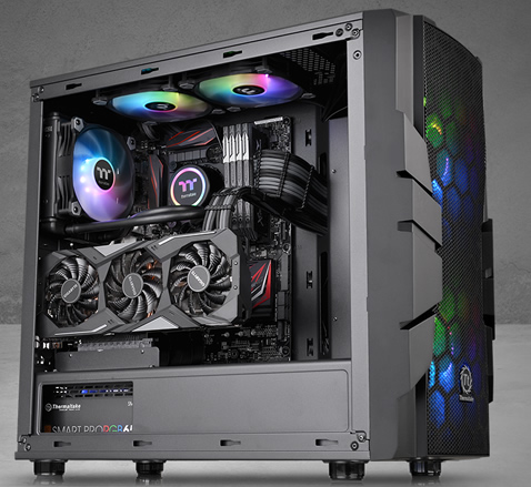 Thermaltake Commander C33 facing to the right fully loaded with components and RGB-lit fans
