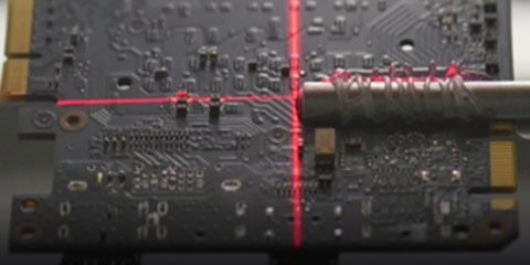 Graphics card board being calibrated at a factory
