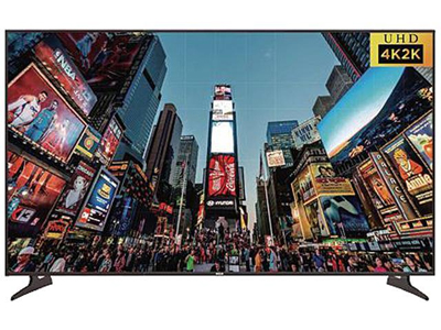 The RCA RTU7575 display facing forward showing a shot of times square during twilight