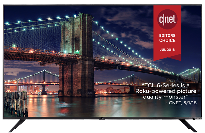 TCL R617 Smart LED Roku Smart TV Facing Forward and A bridge surrounded by lights adorns the charming night view