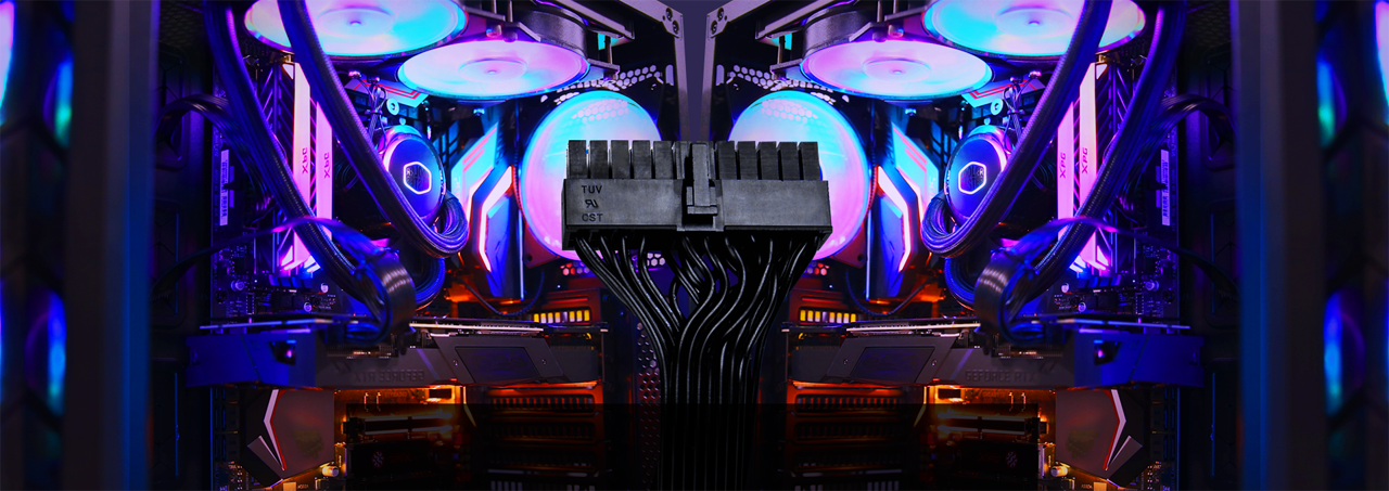 A flat cable is displayed against two illuminated cases.