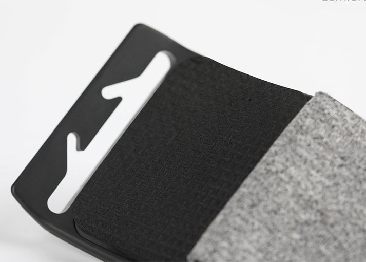 a hand putting things into the storage pocket of PGYTECH Protective Case