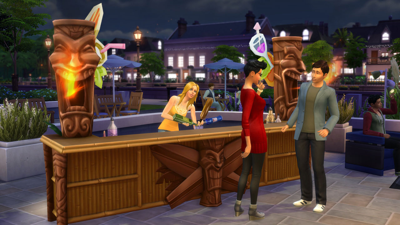 a male and a female chatting in front of a counter in an open-field bar