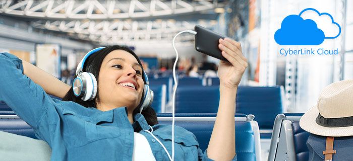 A woman is enjoying content on her smart phone from CyberLink cloud