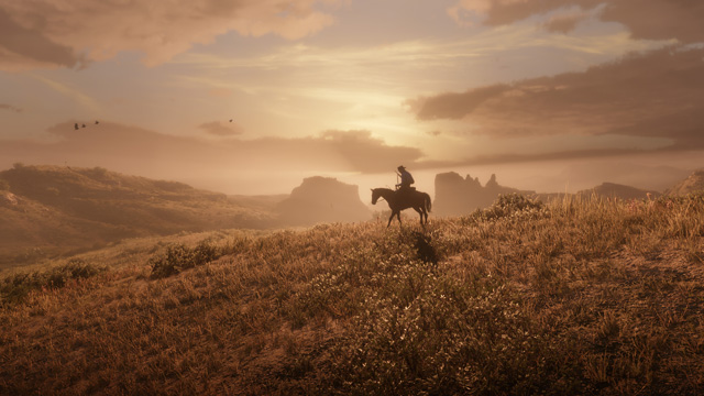 screenshot4 for Red Dead Redemption 2 showing a man on a horse watching sunset
