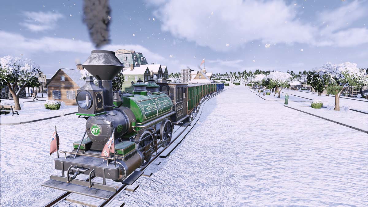 Front side-facing screenshot of a green train stationed in a small, snowy town
