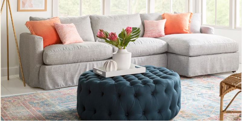 A living room with coordiated sofa and decor