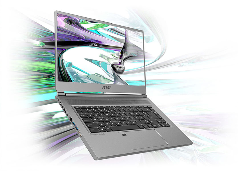 P65 Creator widely opened to right. An art background is on the screen.