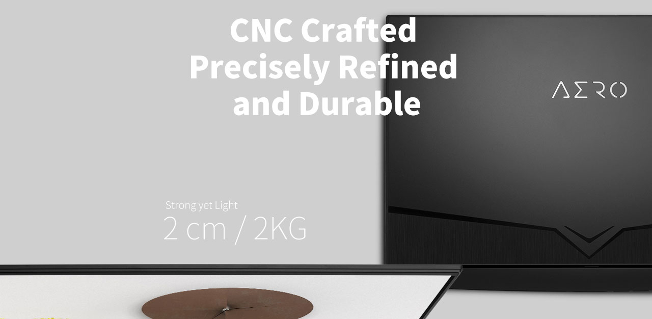 Two views of the Gigabyte Aero 15 Gaming Laptop, overhead of the open display and one of it closed, flat on a surface - There is text that reads: CNC Crafted Precisely Refined and Durable - Strong yet light - 2cm / 2kg