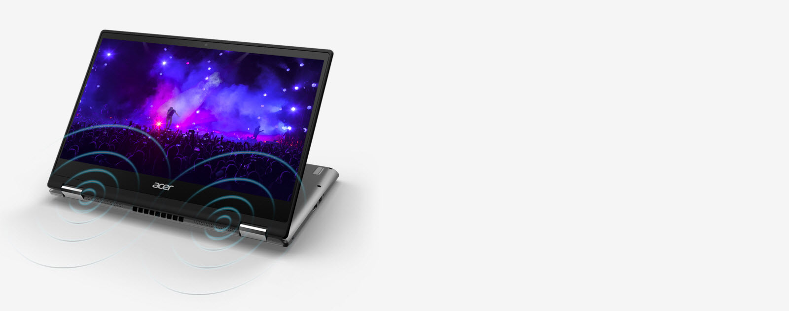 Acer Spin 3 in its stand mode showing a concert picture