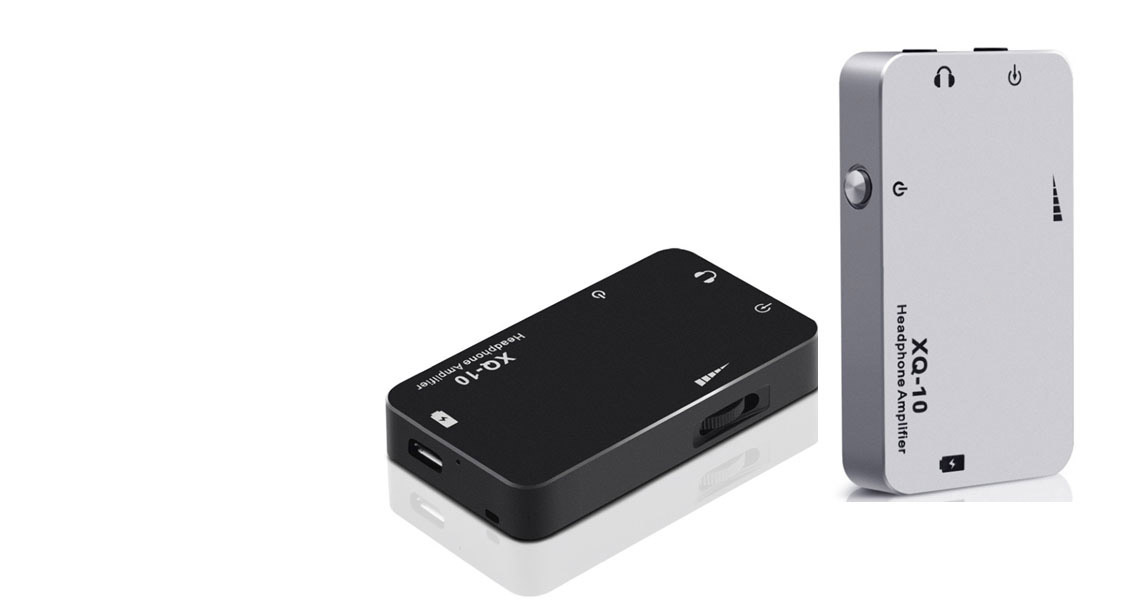 XQ-10 black model lying down angled down to the left next to the white model standing up angled to the right