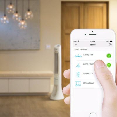 Thumb scrolling on a smartphone in front of a living room