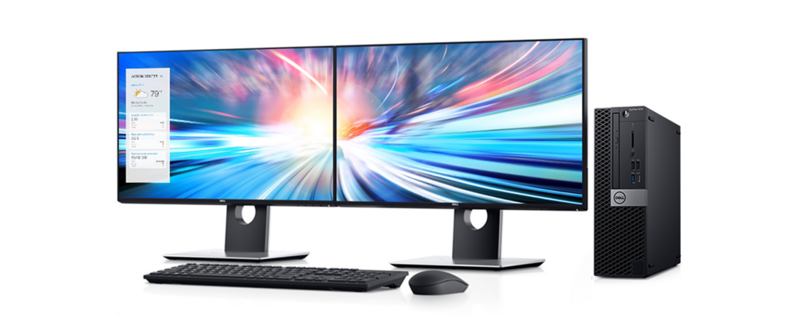 Two monitors are next to a small form factor desktop