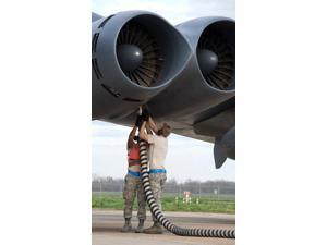 Airmen disconnect an aircraft hose from a B-52H Stratofortress engine Poster Print by Stocktrek Images (11 x 17) Airmen disconnect an aircraft hose from a B-52H Stratofortress engine Poster Print by Stocktrek Images (11 x 17)