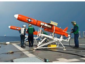 Sailors perform pre-launch checks on a BQM-74 target drone Poster Print by Stocktrek Images (17 x 11) Sailors perform pre-launch checks on a BQM-74 target drone Poster Print by Stocktrek Images (17 x 11)