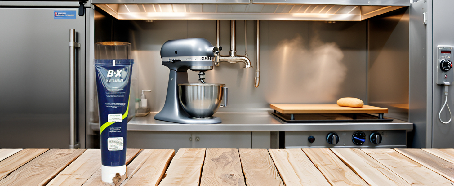 A stainless steel kitchen counter with the product and various food processing equipment.