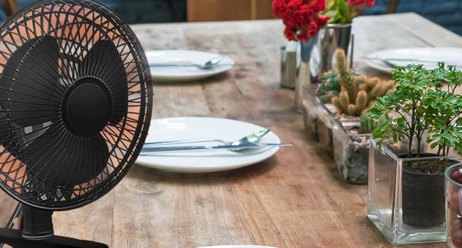 Quiet 6-inch clip-on fan with two-speed settings, perfect for dorms, offices, or bedrooms