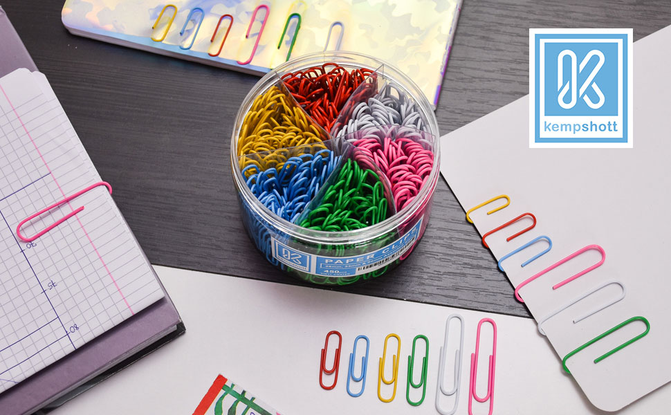 Kempshott Color paper clips box on the table showing some papers fasten by paper clips