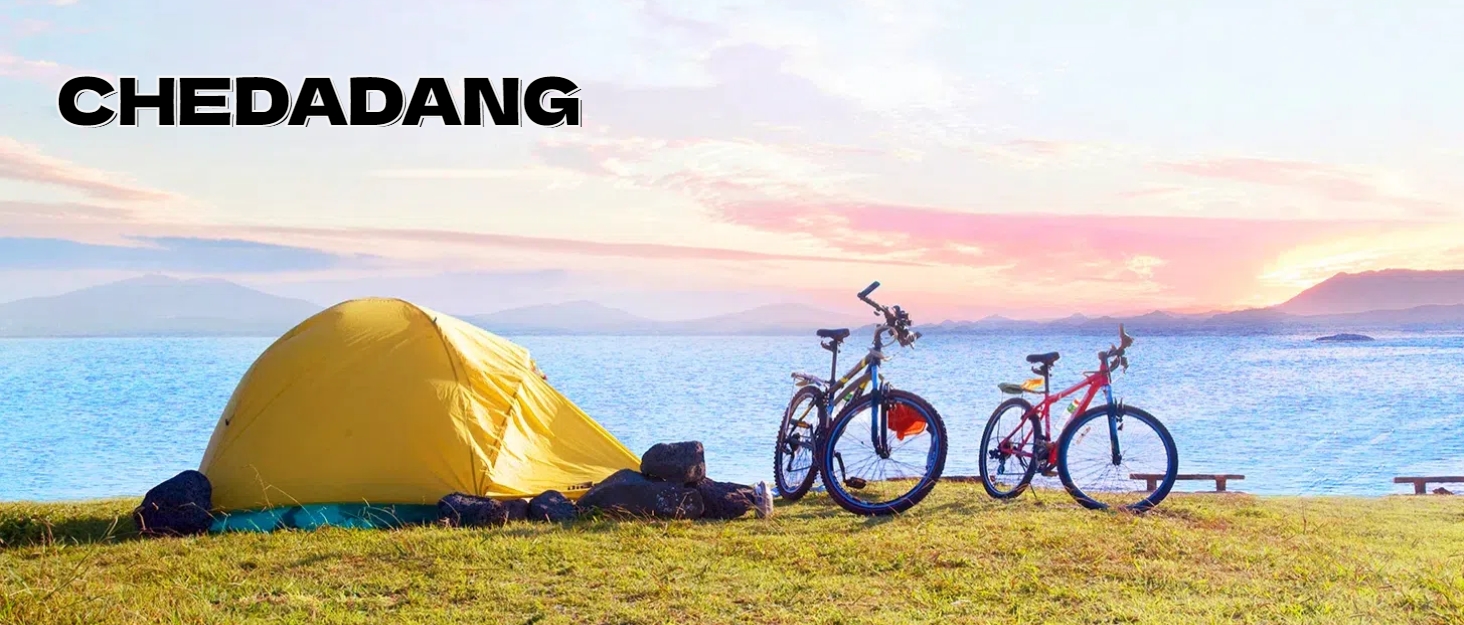 a bike and tent on the beach