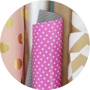 Hallmark gift wrap including pink and gold wrapping paper, kraft paper and polka dot gift wrap