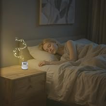 TranquilTone sound machine by a bedside table, helping an adult sleep peacefully through the night