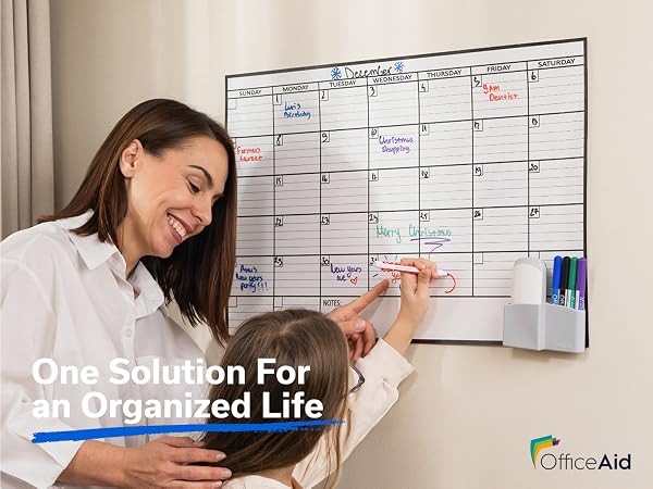 OfficeAid dry erase wall calendar used by a family to organize daily schedules