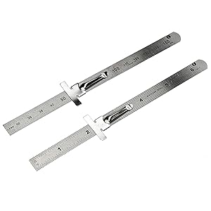 2 rulers on white