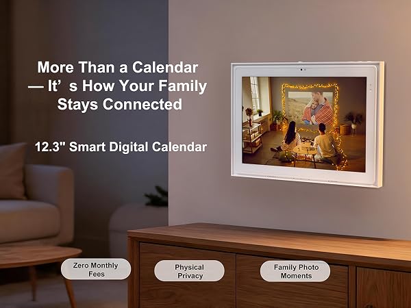 Digital calendar on living room wall showing family photos in soft evening light