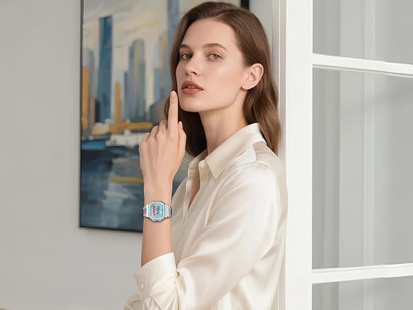 Woman wearing a silver square digital watch stainless steel bracelet retro style for everyday wear