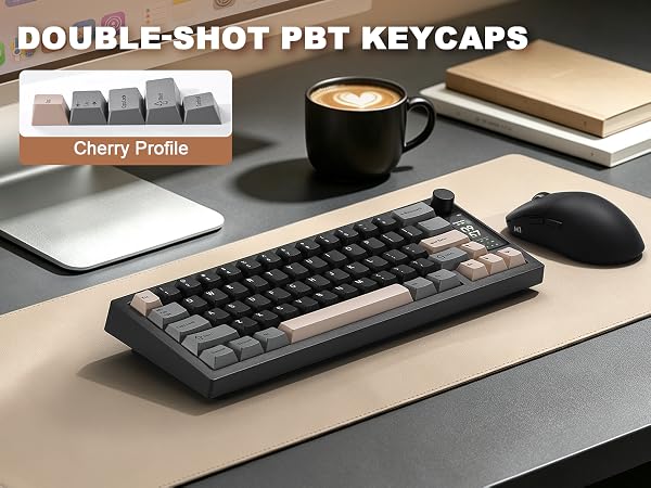 Text reads 'DOUBLE-SHOT PBT KEYCAPS' and 'Cherry Profile'. Mechanical keyboard with dark gray keycaps, coffee cup, and desk accessories on workspace.