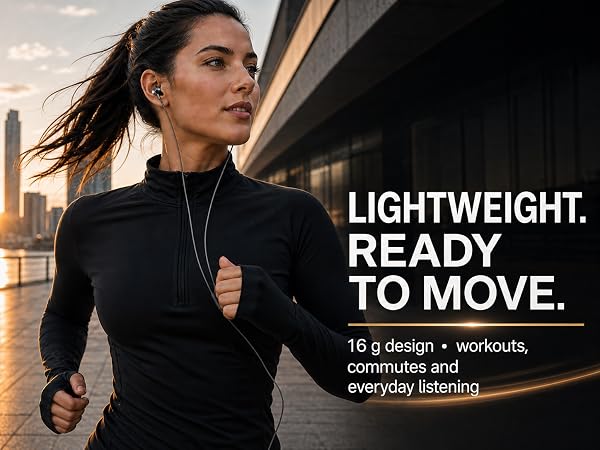Adult runner wearing Betron BS10 wired earphones during an early-morning city workout.