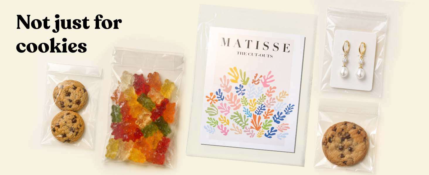 Clear Pack It Chic cello bags holding cookies, gummy candy, an art print, and pearl earrings
