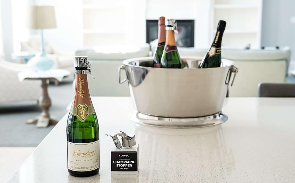 champagne bottle stoppers metal bucket kitchen counter dining living room setting sparkling wine
