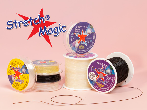 Stretch Magic elastic cord in different colors and varieties with loose string on pink background.