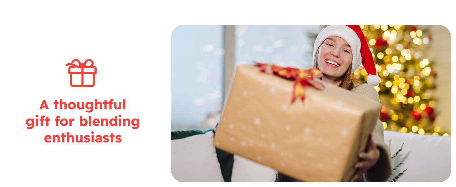 Smiling woman opens a holiday gift, presenting the blender as a gift for blending enthusiasts.