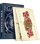 Playing card deck box with ornate blue design alongside oversized Joker card featuring intricate steampunk-style artwork in red and gold tones.