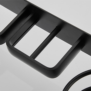 a close up of the black metal frame of the table.
