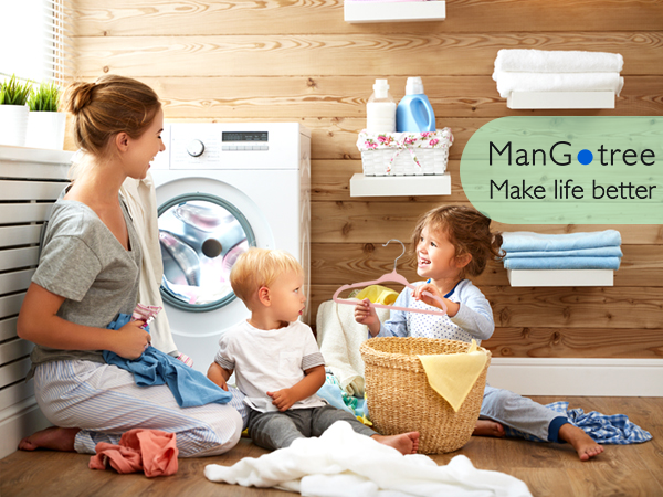 a woman and two children in a laundry room