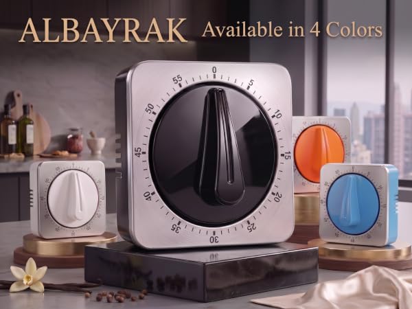 Four Albayrak mechanical timers (black, white, orange, blue) on elegant pedestals in a kitchen.