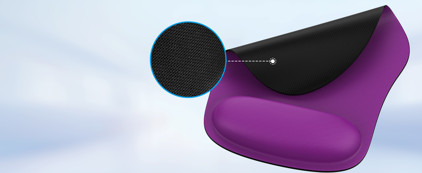Purple ergonomic wrist rest for computer use. Black fabric surface visible. Circular inset shows close-up of textured fabric material.