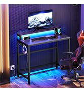 YATINEY Small Computer Desk with Charging Station and LED Lights, Gaming Desk with Monitor Stand,...