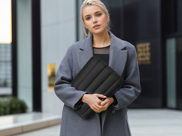 Black puffy laptop sleeve