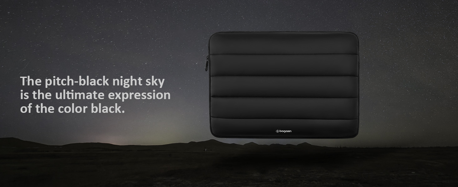 Black puffy laptop sleeve