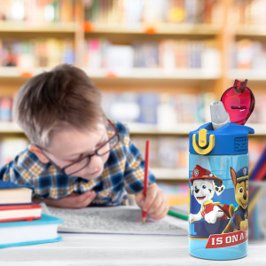 16oz PAW Patrol water bottle with child coloring in background