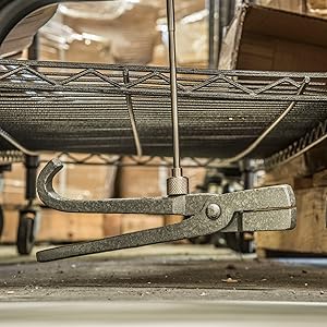Pick up tool picking up fallen pliers under cart
