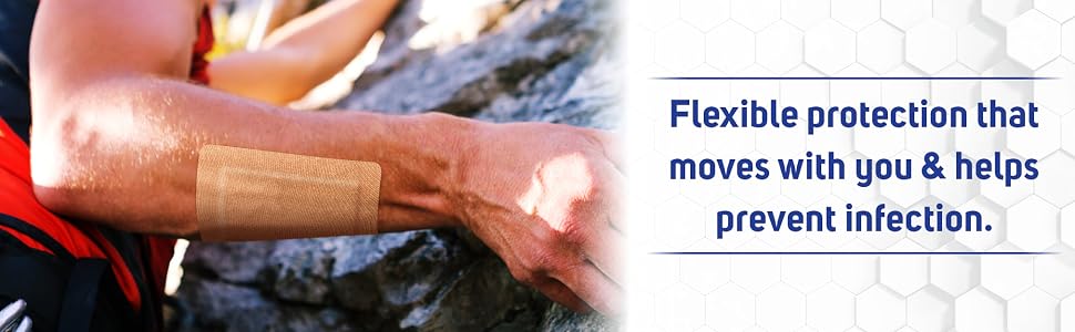 man rock climbing with bandage on arm for minor cuts scrapes or burns