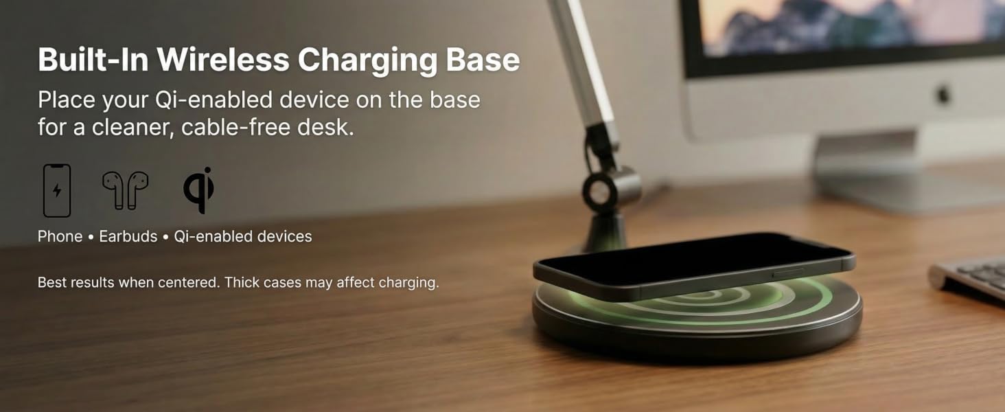 LED desk lamp with built-in wireless charging base charging a smartphone on the desk
