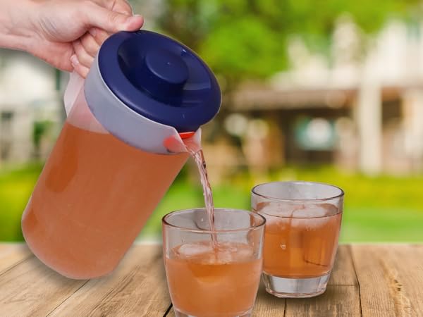 1-gallon easy-pour pitcher serving iced tea outdoors, perfect for refreshments.