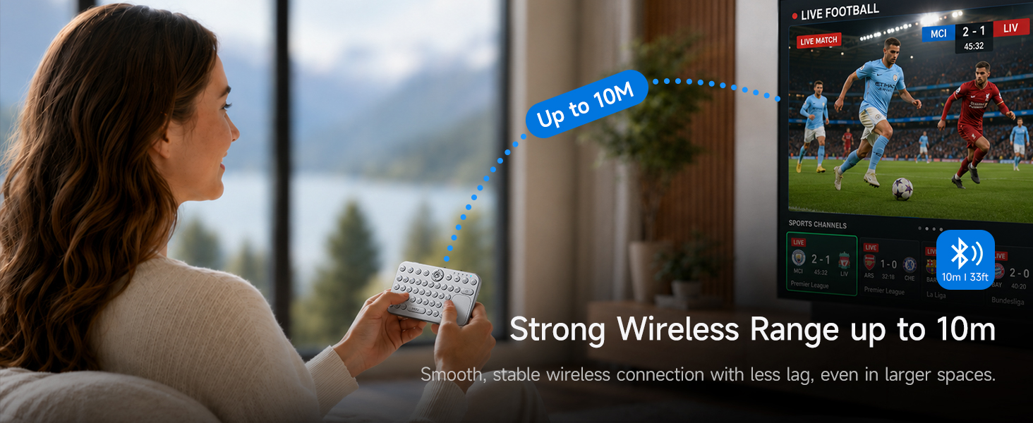 Woman using mini Bluetooth keyboard to control smart TV within 10 meters